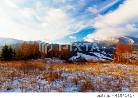 Beautiful mountain snowy landscape. Beautiful sunny day in the mountains. Beautiful mountain snowy landscape. Beautiful sunny day in the mountains. 41041417