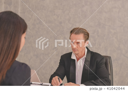 Businesspeople is working in office.  41042044