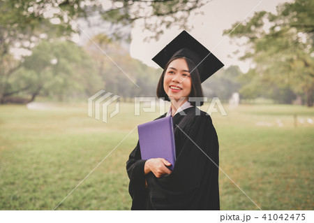 Graduation Concept. Graduated students on graduation day. Asian Graduation Concept. Graduated students on graduation day. Asian 41042475