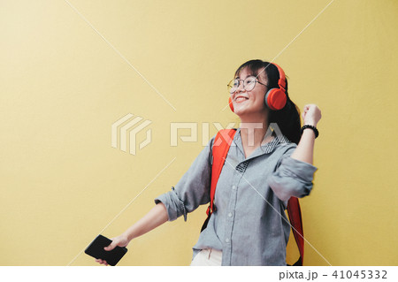 Teen girl enjoy to listen the music 41045332