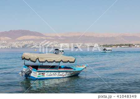 Touristic ships on the beach of Aqaba, Jordan. Pop 41048349