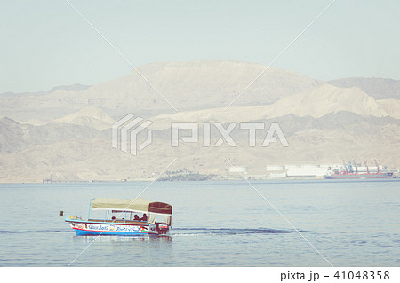 Touristic ships on the beach of Aqaba, Jordan. Pop 41048358