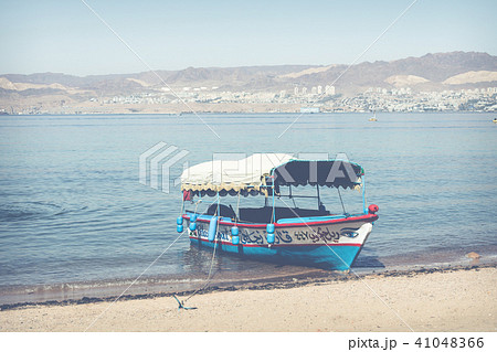 Touristic ships on the beach of Aqaba, Jordan. Pop 41048366