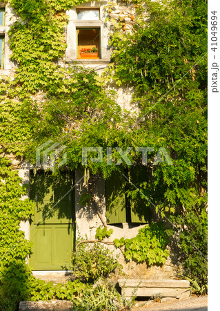 Old overgrown house at small typical town in Provence, France 41049694