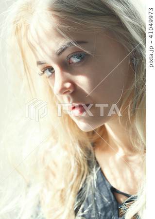 sad blonde woman sad blonde woman 41049973