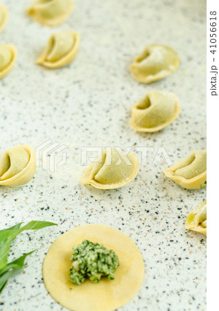 Making tortellini Making tortellini 41056618