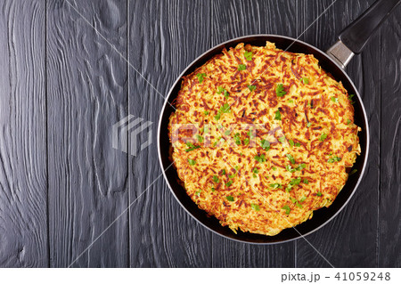 swiss rosti or potato pancake, flat lay swiss rosti or potato pancake, flat lay 41059248