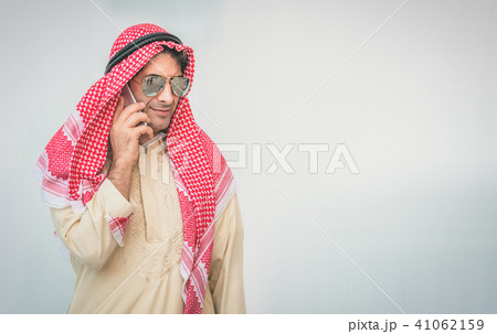 Arab businessman useing on a mobile phone 41062159