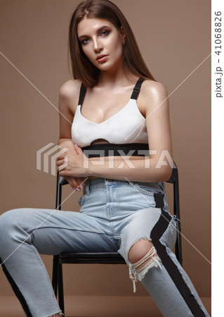 sexy fashion model with long hair, beautiful eyes, full lips, perfect skin is posing in studio for 41068826