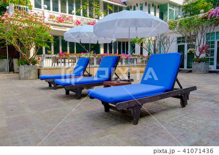 Pool chair With white umbrella 41071436