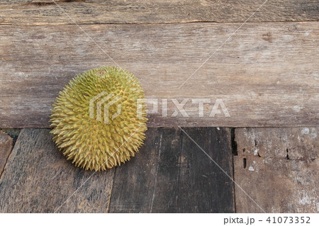 durian fruit which has thorn on wood background 41073352