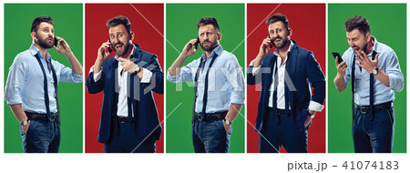 Photos of elegant man using smartphone with various emotions. 41074183