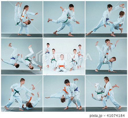 The group of boys and girl fighting at Aikido training in martial arts school. Healthy lifestyle and 41074184