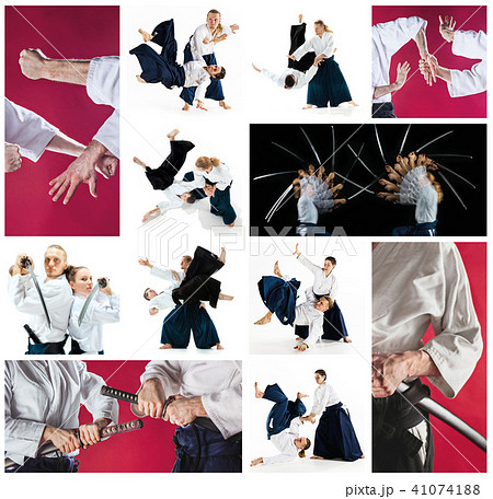 The men and women fighting at Aikido training in martial arts school. Healthy lifestyle and sports The men and women fighting at Aikido training in martial arts school. Healthy lifestyle and sports 41074188