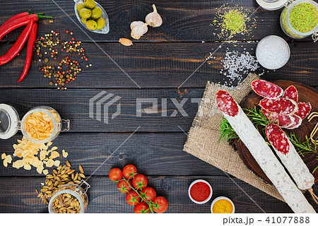 Sliced cured sausage with spices Sliced cured sausage with spices 41077888