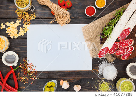 Sliced cured sausage with spices 41077889