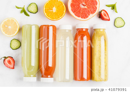 Flat lay of variety colorful smoothies or juices 41079391