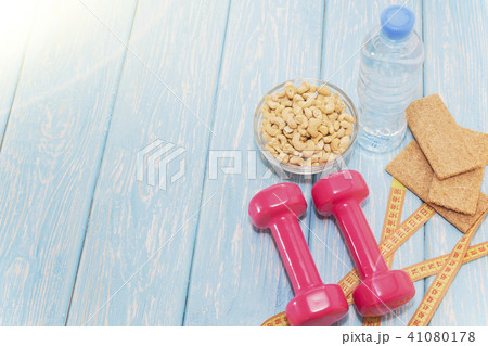 The concept of a healthy diet. Small dumbbells. healthy lifestyle. sport. Fitness food. 41080178