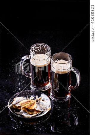 Pair of mugs with beer 41080321
