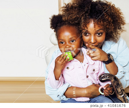 adorable sweet young afro-american mother with cute little daugh 41081676