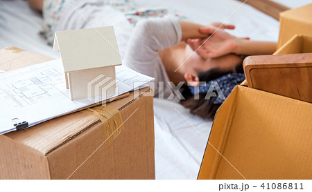 Couple buy a new home. Tried because moving Couple buy a new home. Tried because moving 41086811