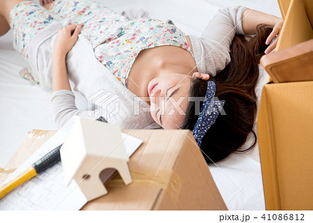 Couple buy a new home. Tried because moving Couple buy a new home. Tried because moving 41086812