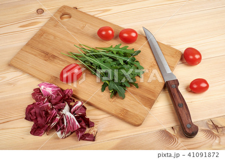 Vegetable and salad set for a healthy dietary lifestyle on a cutting board 41091872