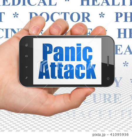 Medicine concept: Hand Holding Smartphone with Panic Attack on display Medicine concept: Hand Holding Smartphone with Panic Attack on display 41095936