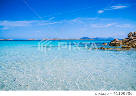 Clear amazing azure coloured sea water with granite rocks in Capriccioli beach, Sardinia, Italy 41100706