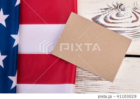 American flag on white wooden background. American flag on white wooden background. 41103029