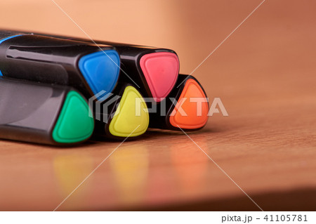 colored markers on the school table 41105781