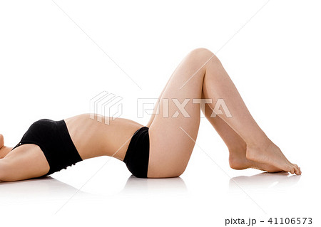 woman with long slender legs in black underwear woman with long slender legs in black underwear 41106573