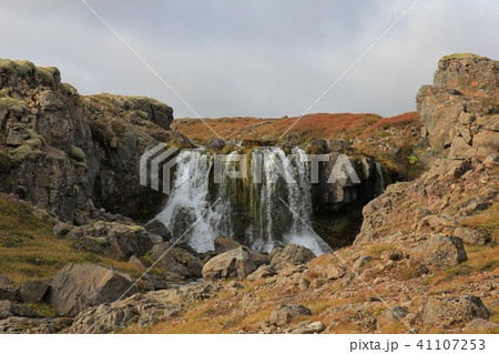 Small waterfall in the westfjords of Iceland. Small waterfall in the westfjords of Iceland. 41107253