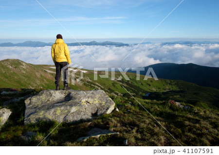 Alone tourist in yellow jacket 41107591