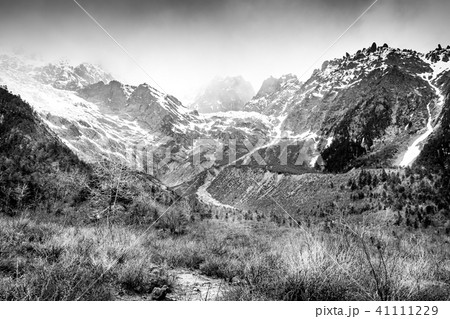 Dramatic black and white Meili snow mountain Dramatic black and white Meili snow mountain 41111229