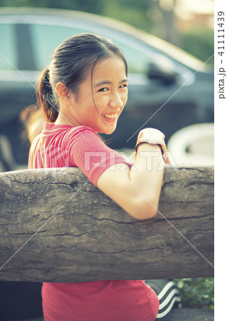 asian teenager toothy smiling face  41111439