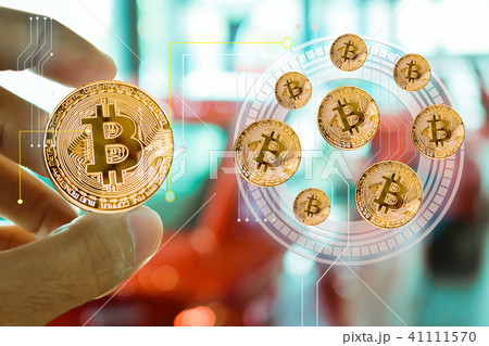 Asian man business holding tecnology bit coin Asian man business holding tecnology bit coin 41111570