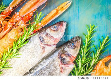 Fresh seafood on blue background 41118843