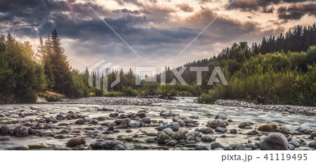Water Flowing over the Rocks in the River 41119495