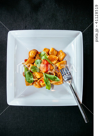 Potato gnocchi with spinach octopus and parmesan 41128519