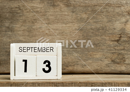 White block calendar present date 13 and September 41129334