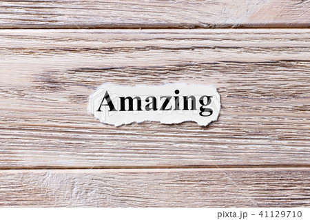 Words of AMAZING on a wooden background Words of AMAZING on a wooden background 41129710