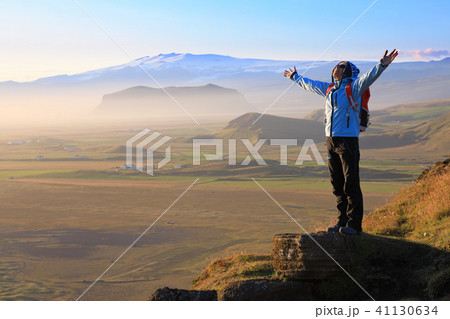 Tourist enjoying the beauty of Iceland landscape 41130634