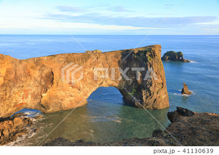 Famous Rock arch at Dyrholaey coast, Iceland. Famous Rock arch at Dyrholaey coast, Iceland. 41130639