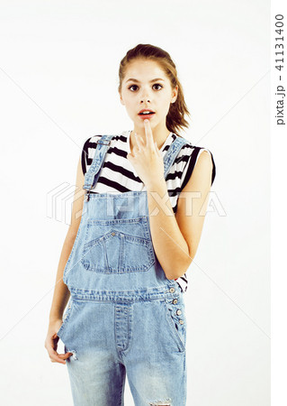 young pretty stylish blond hipster girl posing emotional isolate 41131400