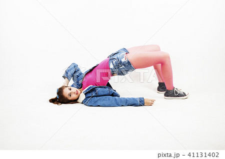 young pretty stylish blond hipster girl posing emotional isolate 41131402