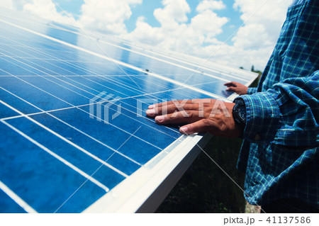 engineer team working on replacement solar panel 41137586