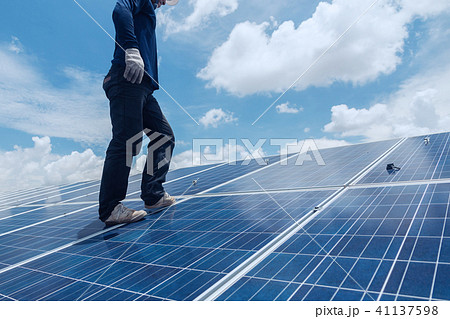 engineer team working on replacement solar panel engineer team working on replacement solar panel 41137598