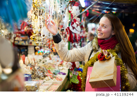 Female customer at the Christmas Fair Female customer at the Christmas Fair 41139244