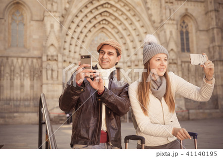 Cheerful man and woman making selfie Cheerful man and woman making selfie 41140195